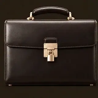 Locked leather briefcase — Royal Reels